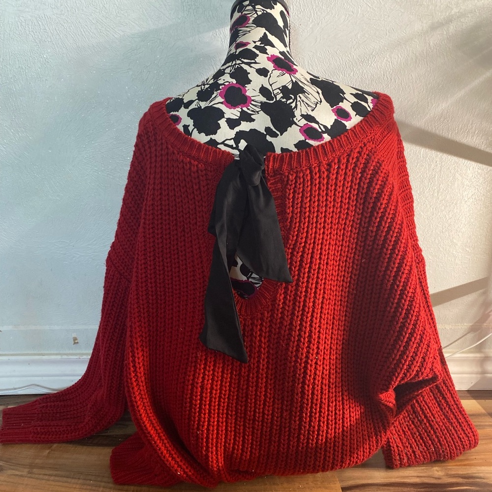Red sweater with tie in back